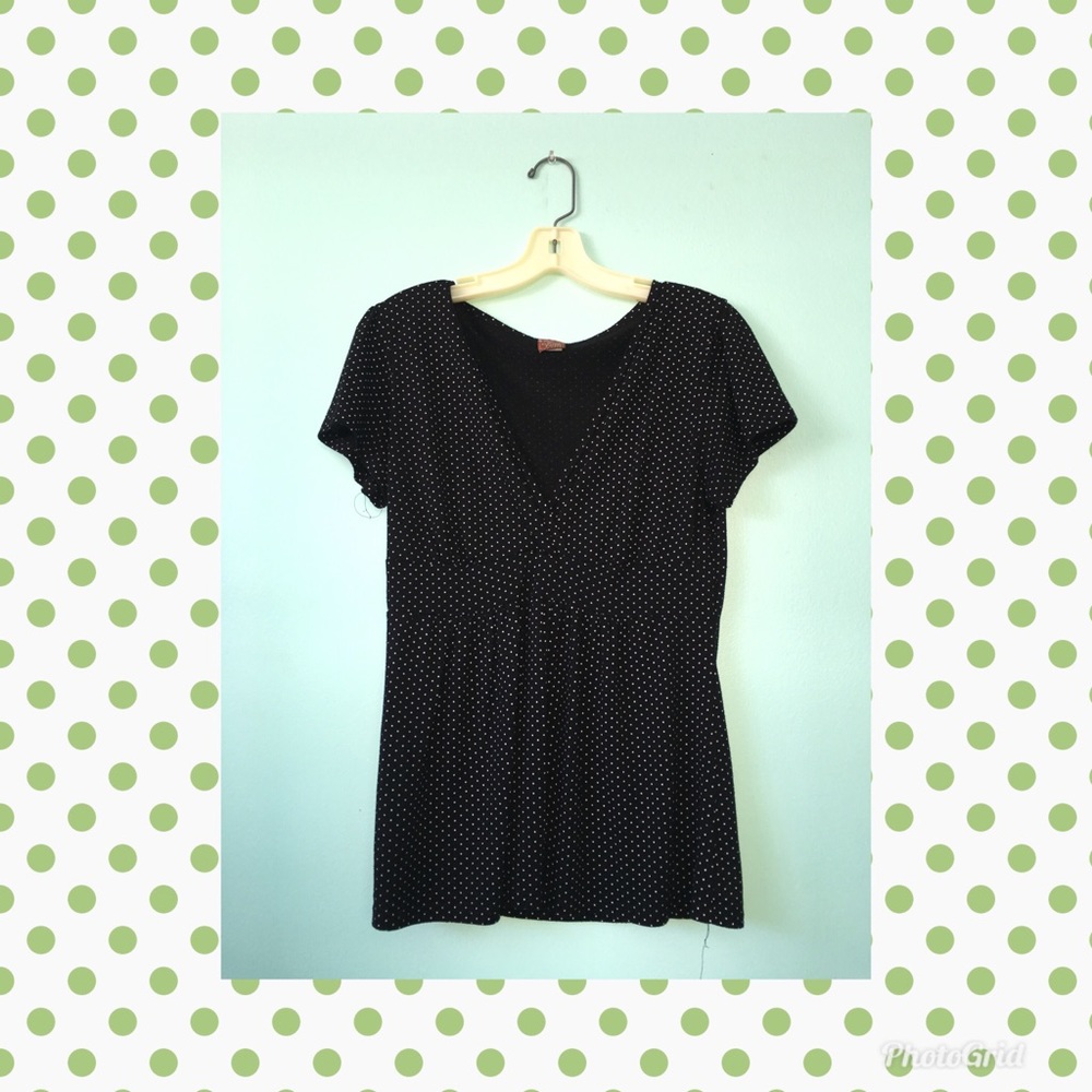 Black, polka dotted blouse